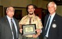 Special recognition of Troop #3's 100th Anniversity: Scoutmaster Mike Bajor, Bill Burgess (left) representative of the sponsoring organization, the Morrisville Presbyterian Church, and Pres. Hal Long